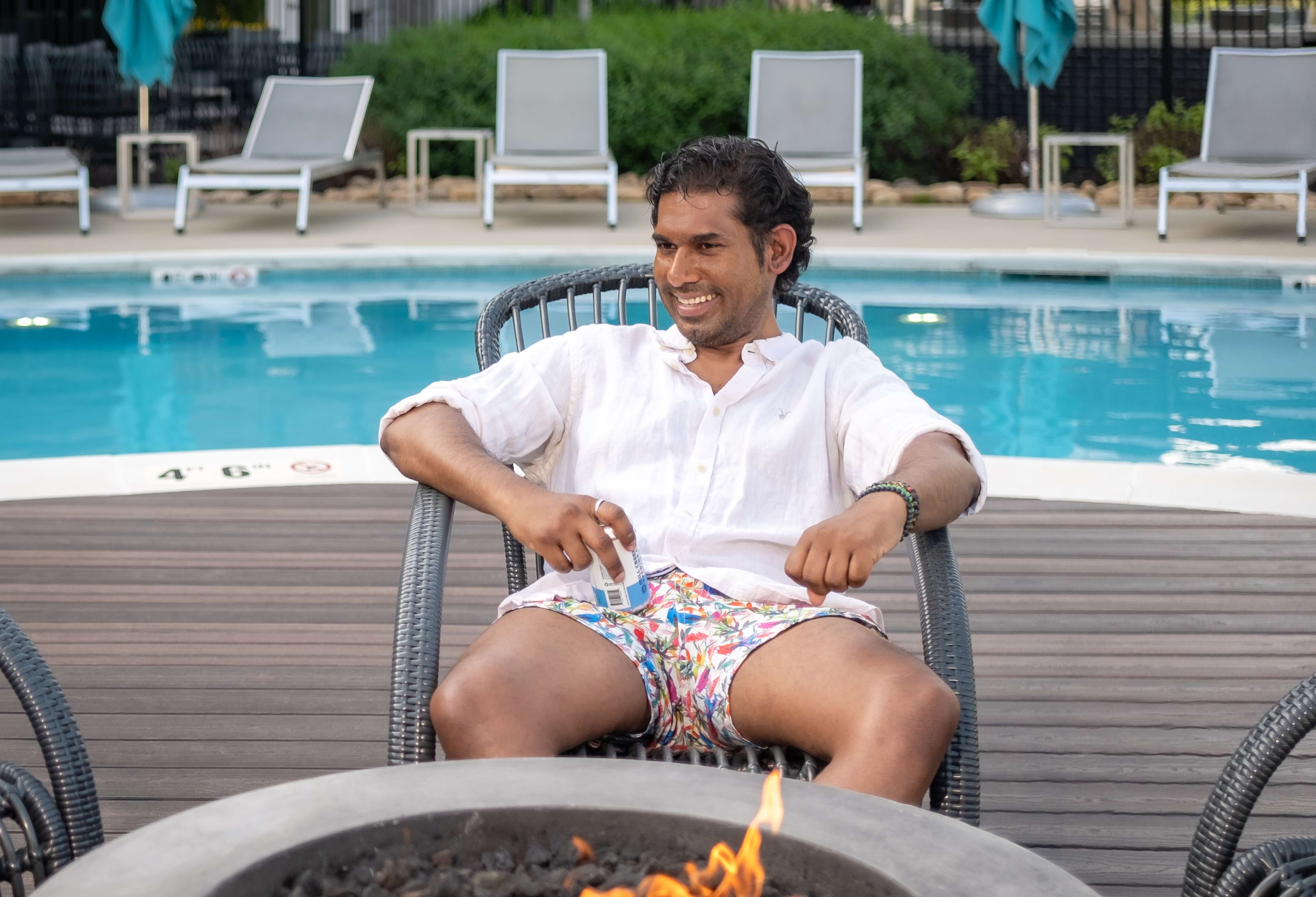 Residents Enjoying The Fire Pit at Our Cortland Apartments