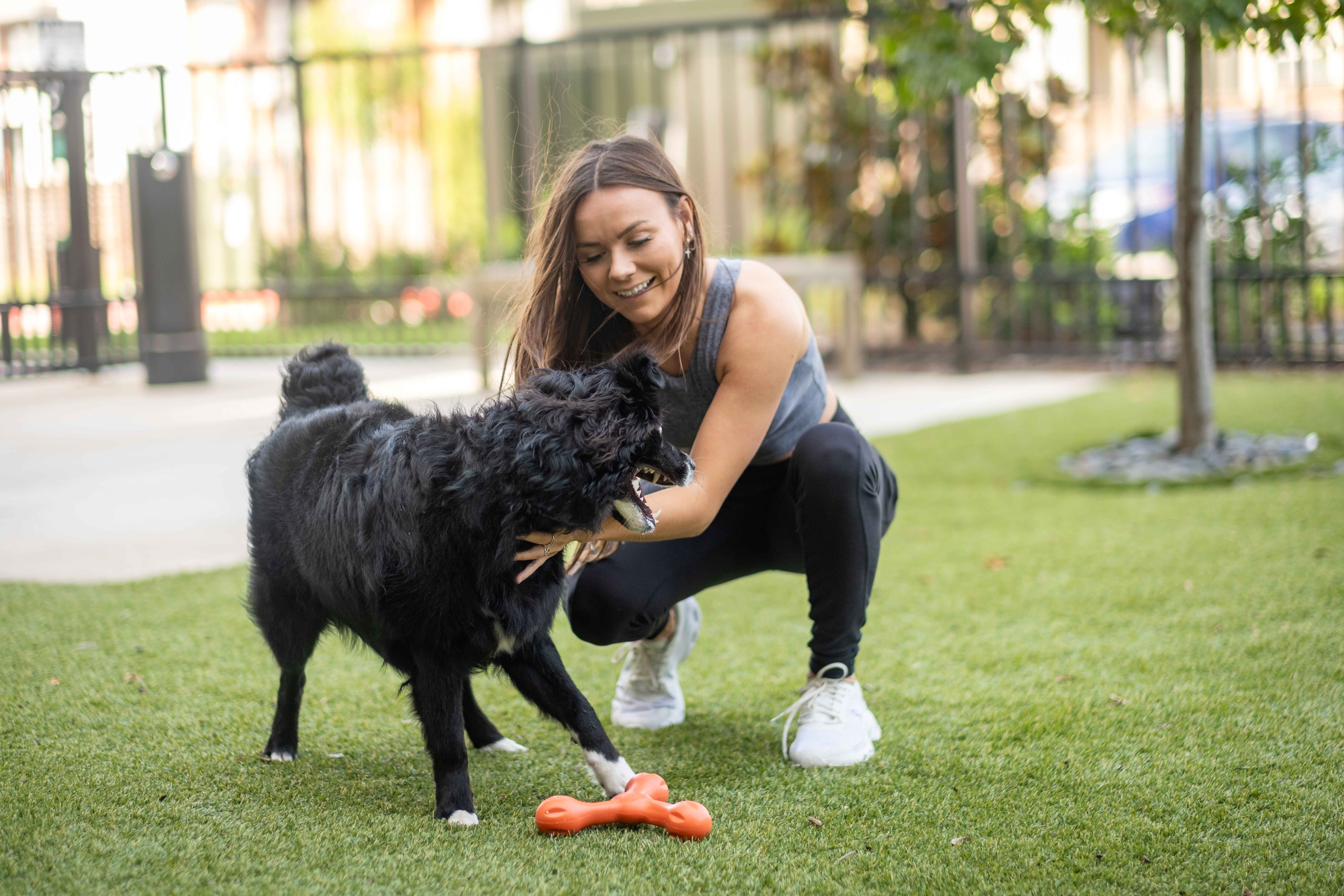 Resident With Their Dog at Our Pet-Friendly Apartments