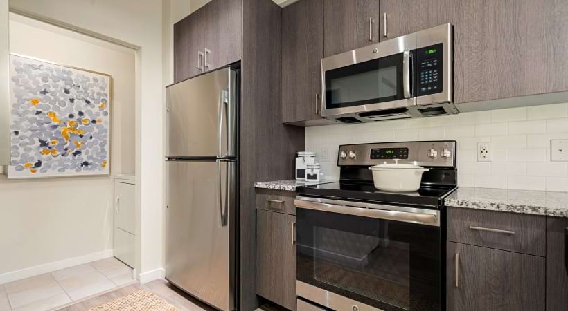 Kitchen with Stainless Steel Appliances at Our Apartments in Hollywood, FL