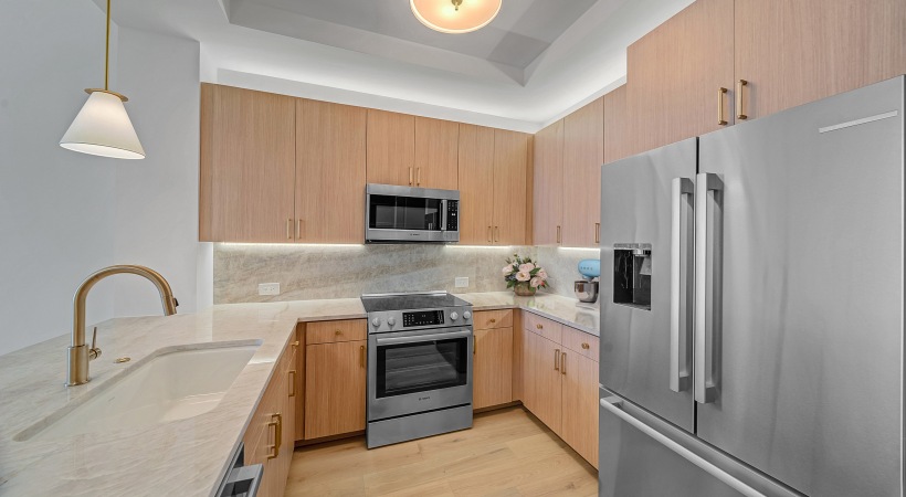 Kitchen with Stainless Steel Appliances in Our Harwood District Apartments