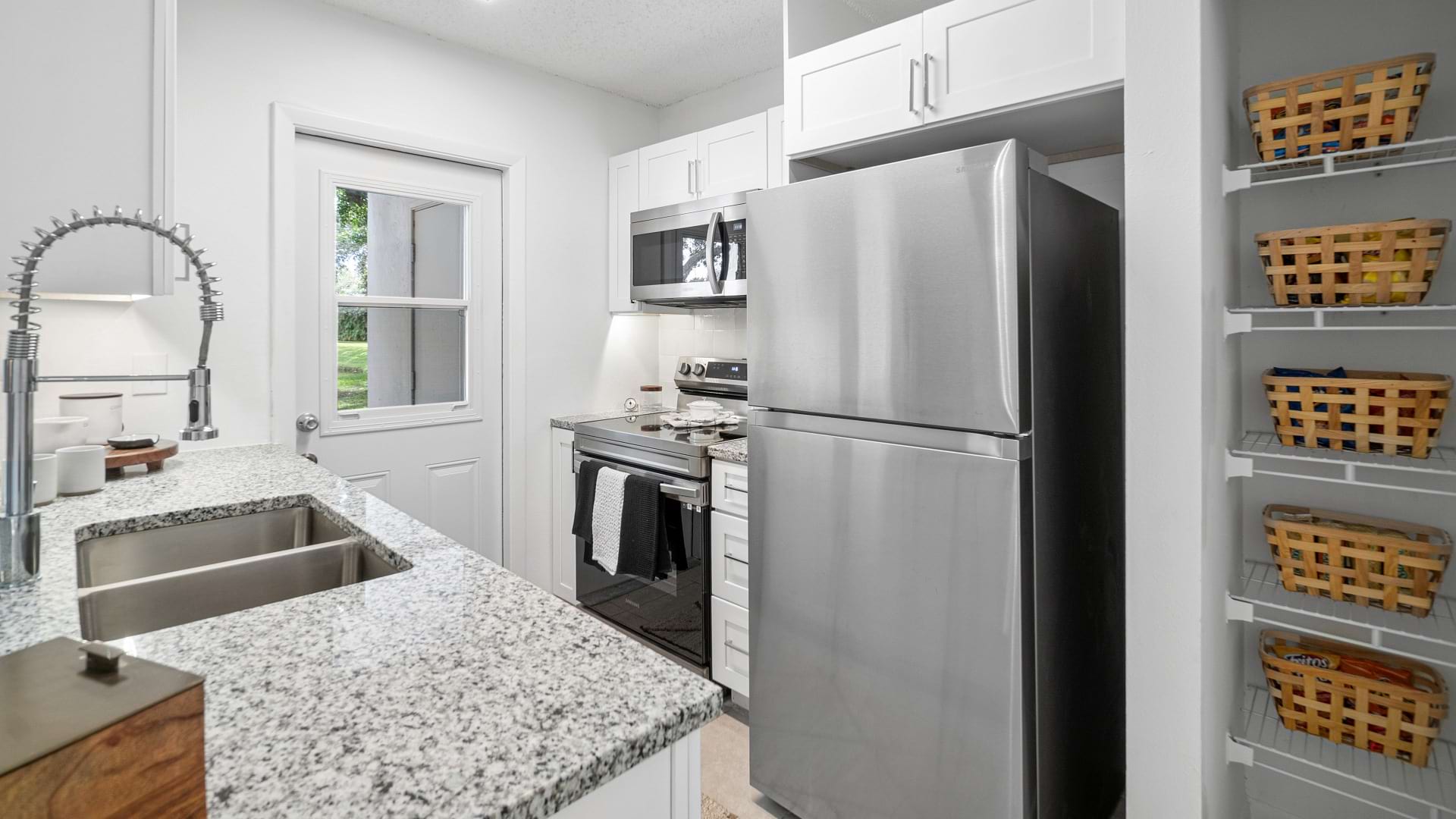 Stainless-Steel Appliances in the Kitchen of Out Modern Apartments in Pembroke Pines, FL