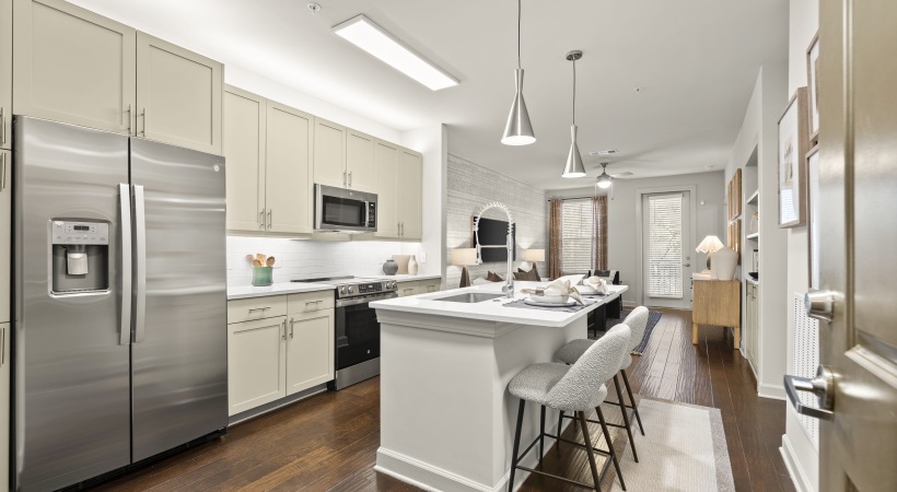 Expansive Kitchen with Energy-Efficient, Stainless Steel Appliances at Our Apartments in Lindbergh