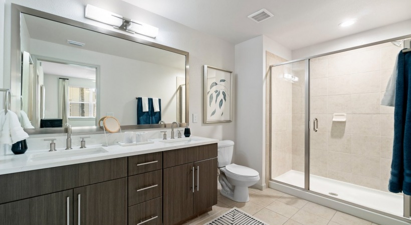 Bathroom with Walk-In Shower at Our Apartments Near Palm Beach Outlets
