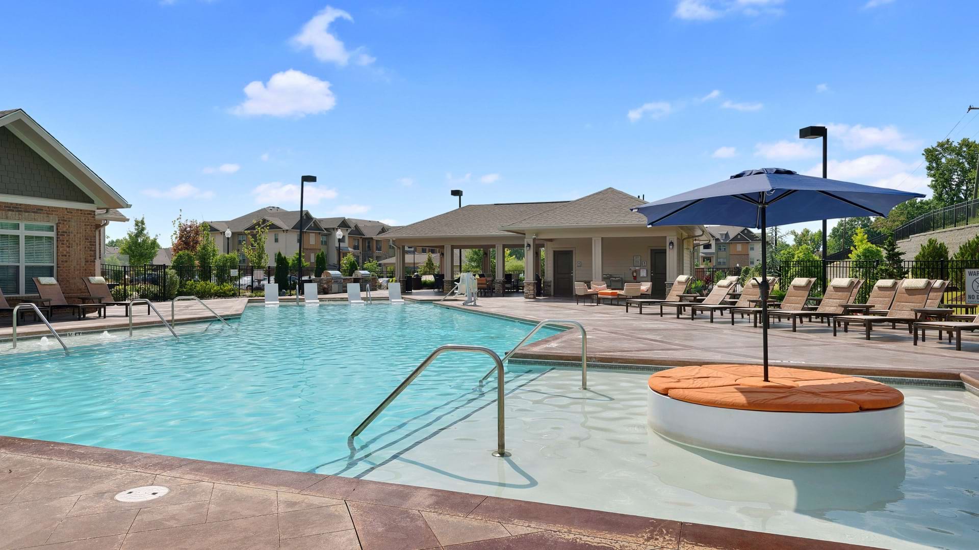 Resort-Style Pool and Sun Deck At Our University City Apartments
