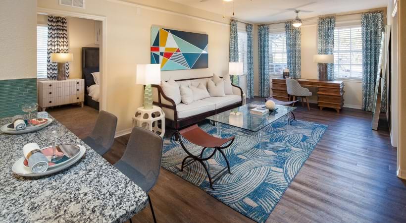 Living Area with Wood-Style Flooring at Our Portofino Apartments in West Palm Beach, Florida