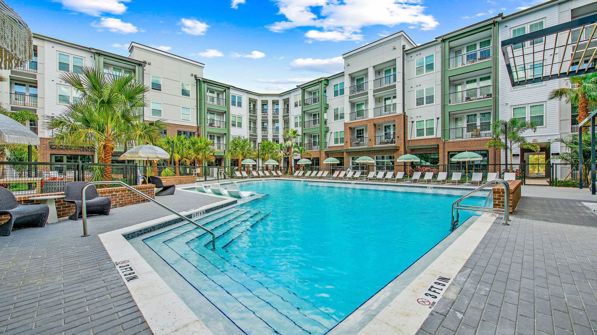 Resort-Style Swimming Pool With Cabanas at Our Apartments Near Brandon