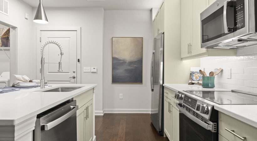 Expansive Kitchen with Energy-Efficient, Stainless Steel Appliances at Our Lindbergh Drive Apartments