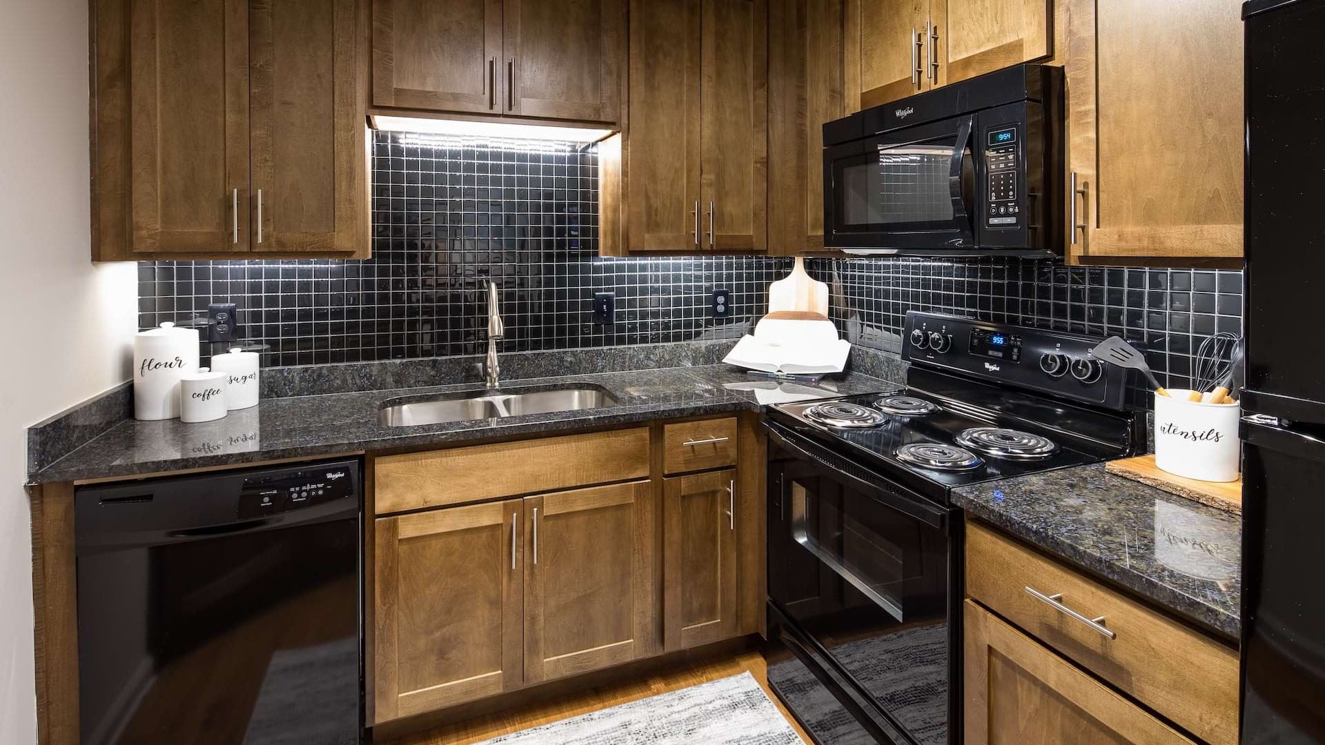 Luxury Kitchen with Sleek Granite Countertops at Our Apartments Near Emory