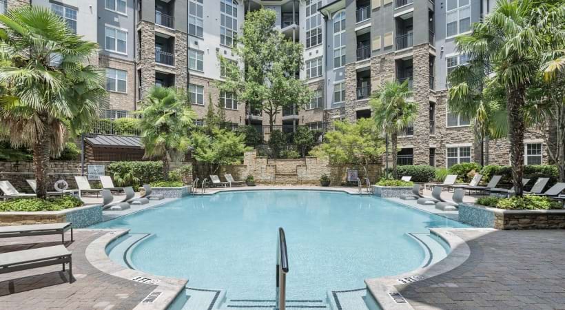Swimming Pool with Poolside Chairs 
