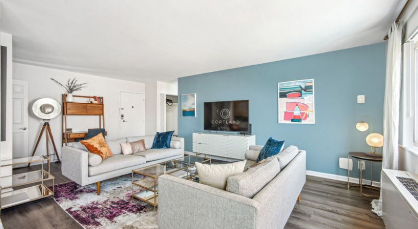 Cozy Living Room with Wood-Style Flooring at Our Arlington Apartments in Columbia Pike