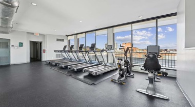 24/7 Fitness Center with Cardio Equipment at Our Arlington Apartment Community