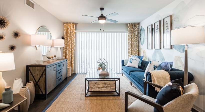 Modern Living Room with Wood-Style Flooring at Our Apartments for Rent in Boynton Beach