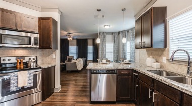 Modern apartment kitchen at our Cypress apartments for rent