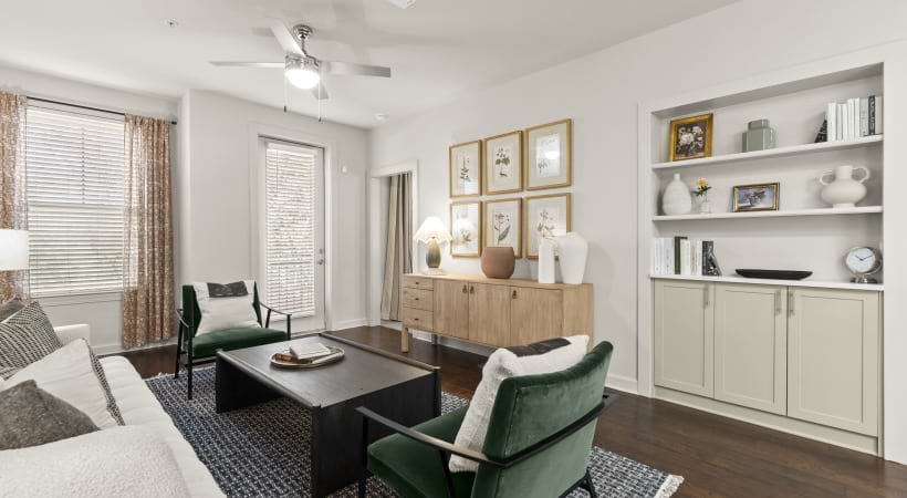 Spacious Living Room with Wood-Style Flooring at Our Apartments in Lindbergh, GA