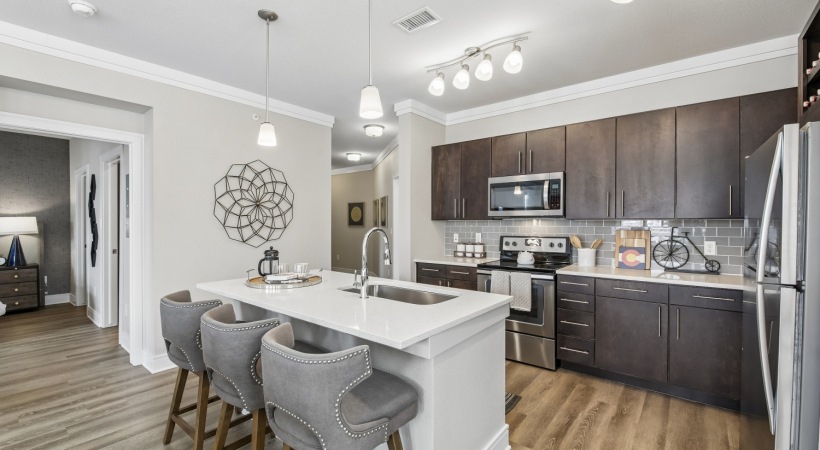 Modern Kitchen Fixtures and Island at Our Broomfield Apartments 