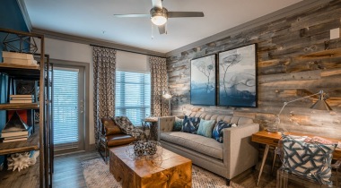 Living room with ceiling fans at our luxury apartments in North Carolina