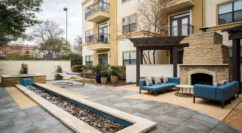 Outdoor fireplace at Addison apartments for rent