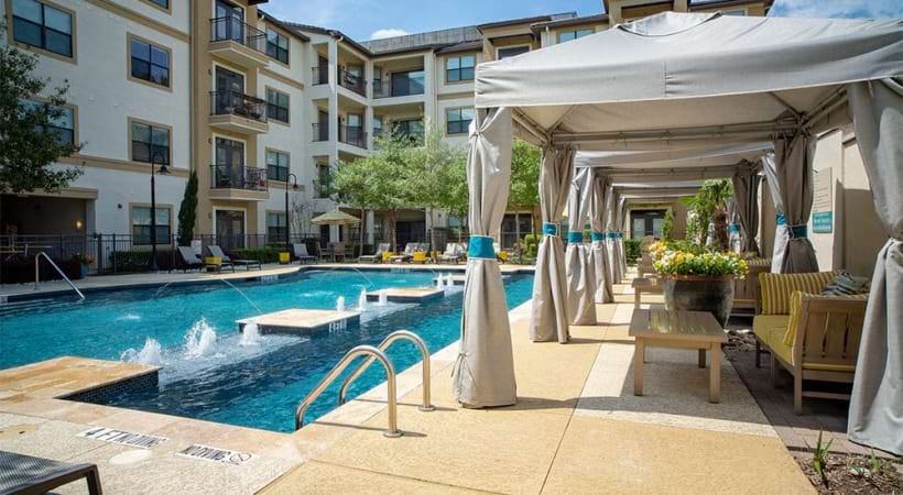 Poolside cabanas at Addison Circle apartments