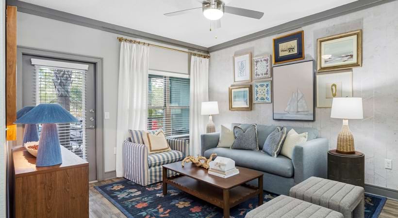 Living Room with Wood-Style Flooring at Our Lake Buena Vista, Florida Apartments