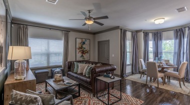 Spacious living room with 9 foot ceilings at our luxury apartments for rent in Prosper, TX