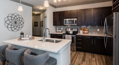 Modern Kitchen Fixtures and Island at Our Broomfield Apartments 