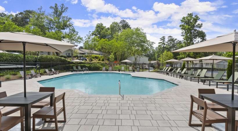 Resort-Style Pool with a Sun Deck at Our Modern Apartments for Rent Near Norcross, GA