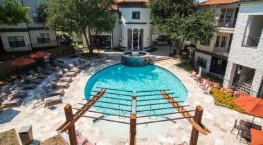 Resort-style pool with sundeck at our Cortland apartments for rent in Irving, TX