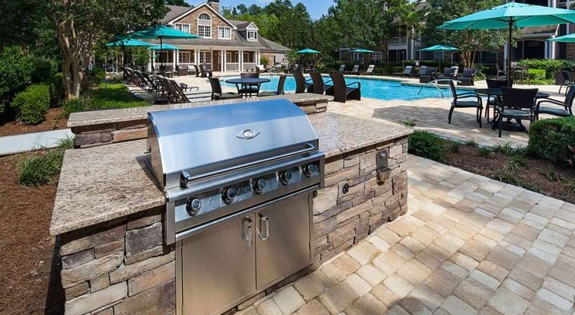 Gas Grill Near the Pool at Our Apartments Near Research Triangle Park, NC
