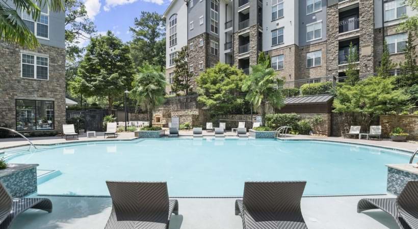 Pool with Poolside Seating  at Our Apartments Near North Druid Hills