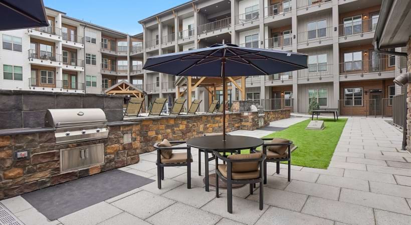 Gas Grills with Nearby Tables at Our Colorado Springs Luxury Apartments