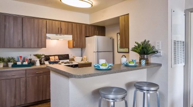 Kitchen with Bar Seating at Our Heathrow Apartments