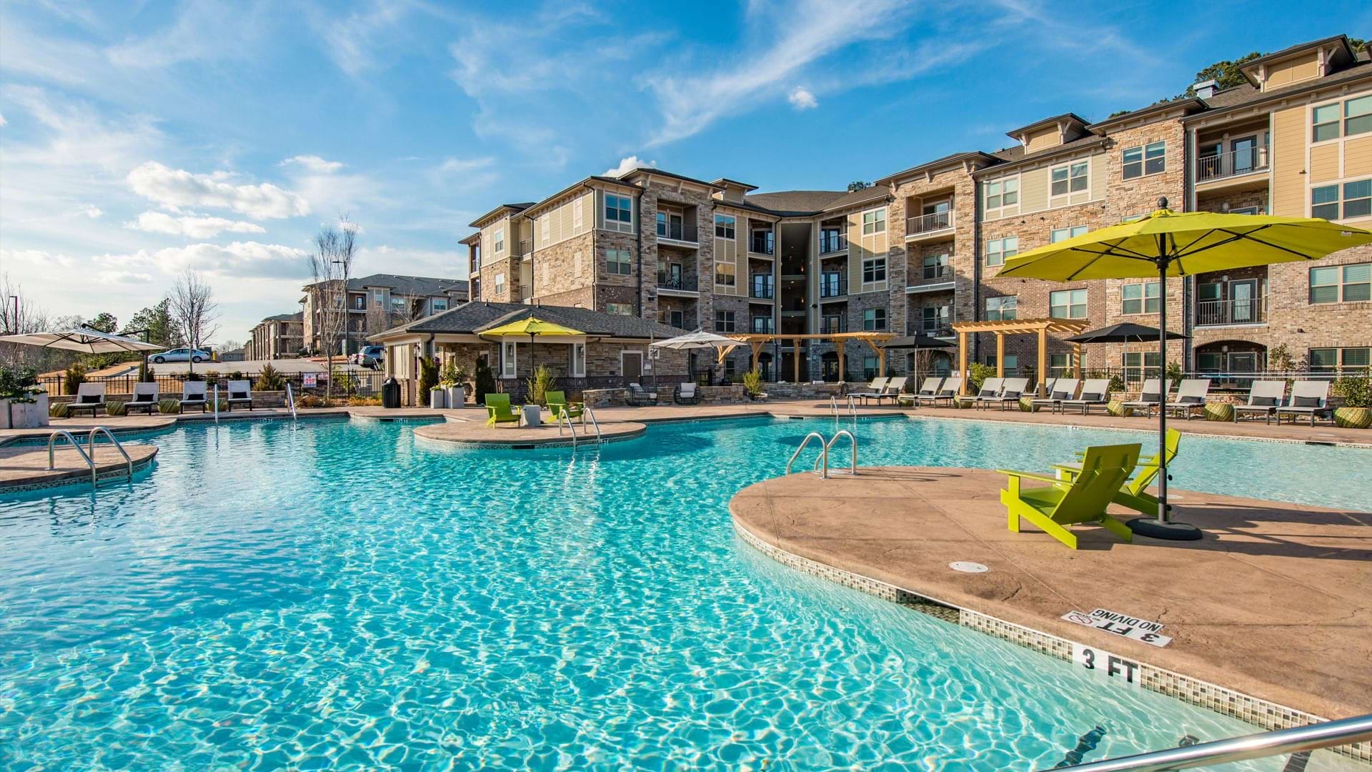 RTP Apartments With Resort-Style Saltwater Pool And Lounging Chairs