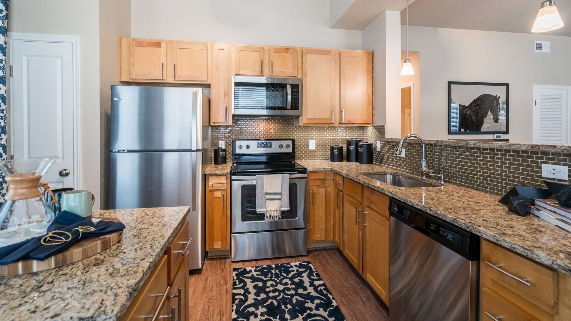 Spacious Kitchen With Stainless Steel Appliances At Our Apartments Near Lake Travis
