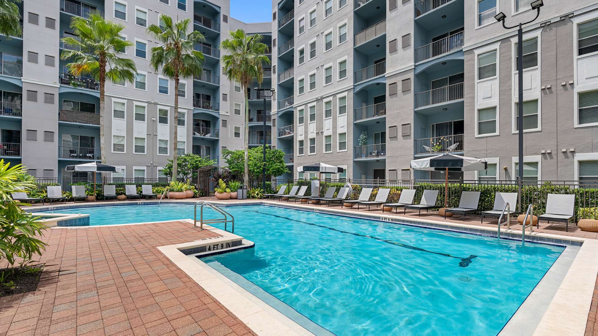 Resort-Style Pool with Lounge Chairs at Our Apartments for Rent in Altamonte Springs, FL