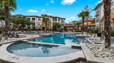 Our Las Colinas luxury apartment pool with heated spa