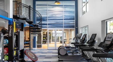 Two-Story, 24/7 Fitness Center with Cardio Machines at Our Gateway Apartments