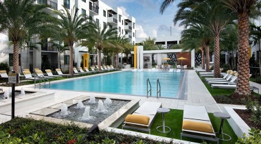 Resort-Style Pool with Lounge Chairs at Our Parkland Apartments for Rent