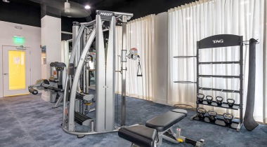 24/7 Fitness Center with Weight Training Equipment at Our Seabreeze Apartments in Daytona Beach,FL