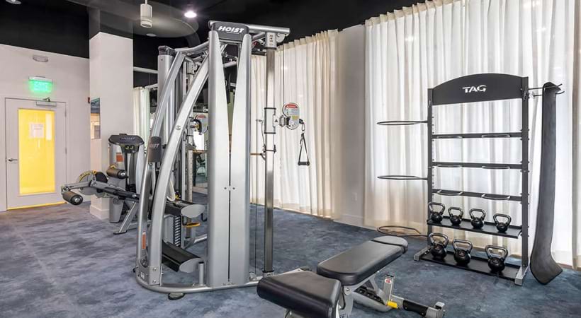 24/7 Fitness Center with Weights at Our Seabreeze Apartments in Daytona Beach, FL
