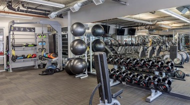 Free Weights in the 24/7 Fitness Center at Our Lofts in Denver for Rent