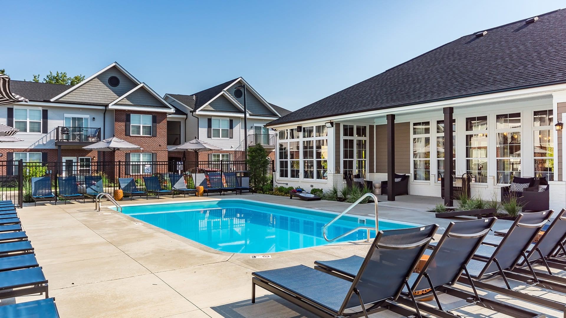 Sparkling Swimming Pool and Lounge Chairs at Our Peyton Park Apartments