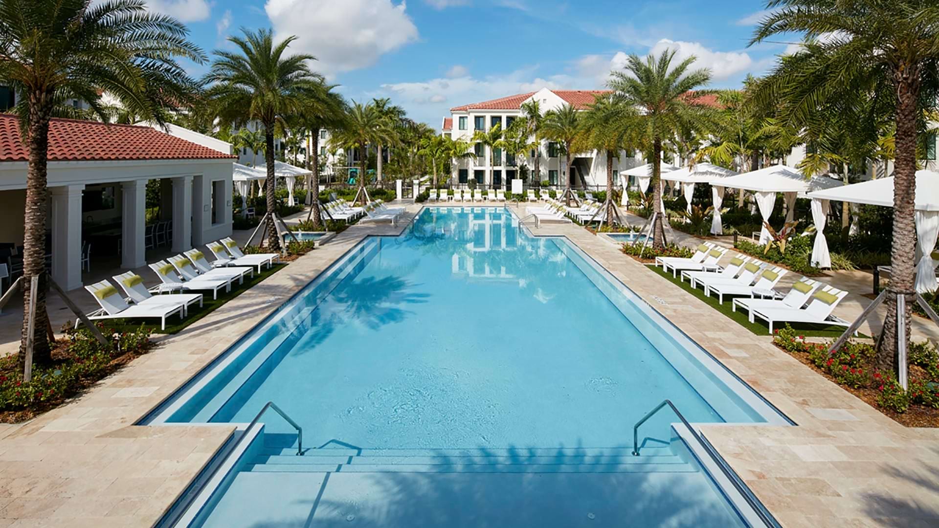 Resort-Style Pool with Cabanas at Our Kendall Luxury Apartments