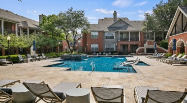 Resort-Style Pool And Lounge Chairs At Our Richardson Apartments