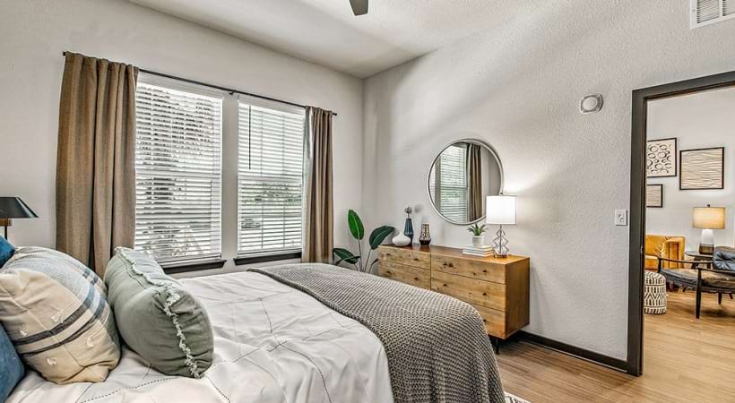 Spacious Bedroom With Large Windows at Our Apartments Near Brandon