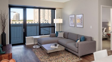Living Room with Wood-Style Flooring at Our Luxury Apartments in Downtown Minneapolis