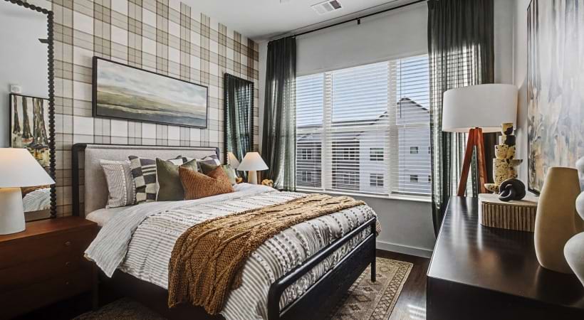 Bedroom  with a Ceiling Fan at Our Luxury Colorado Springs, CO Apartments