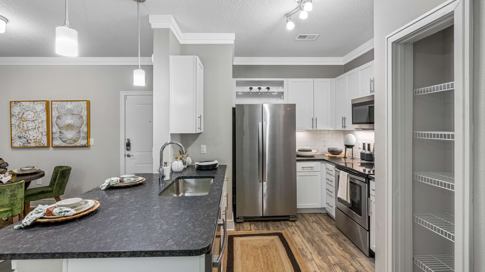 Luxury apartment kitchen with stainless steel appliances 
