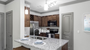 Kitchen with Built-In Wine Racks at Our Lake Buena Vista Apartments