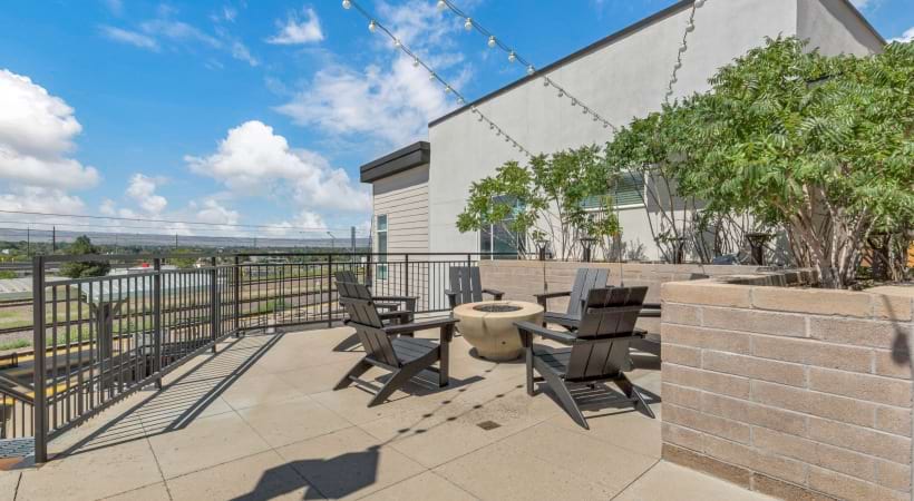 Rooftop Lounge with a Fire Pit at Our Broadway Apartments For Rent