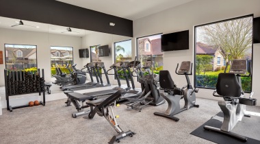 Fitness center at our active adult apartments in Pearland, TX